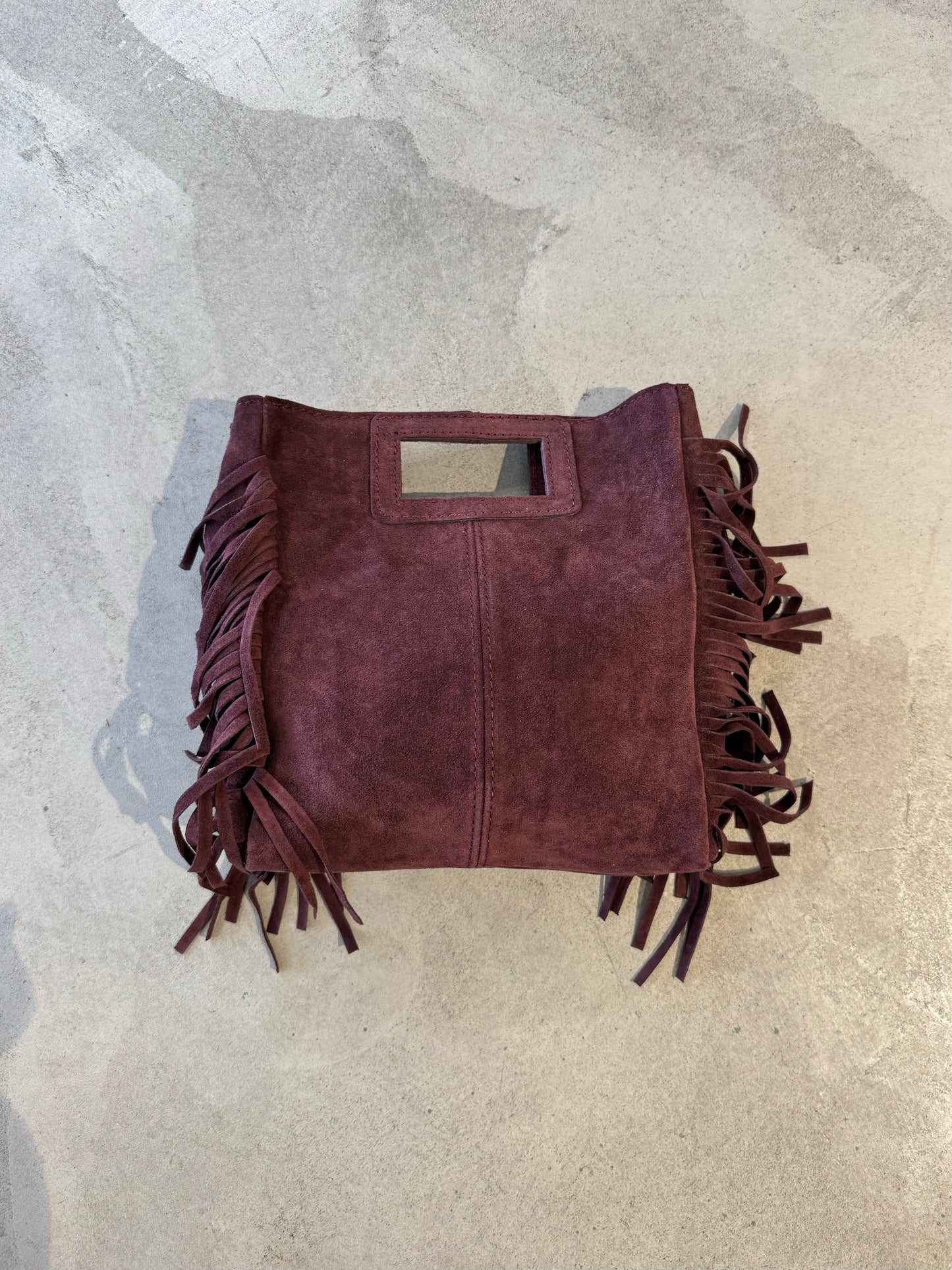 Borsa in camoscio con frange e tracolla