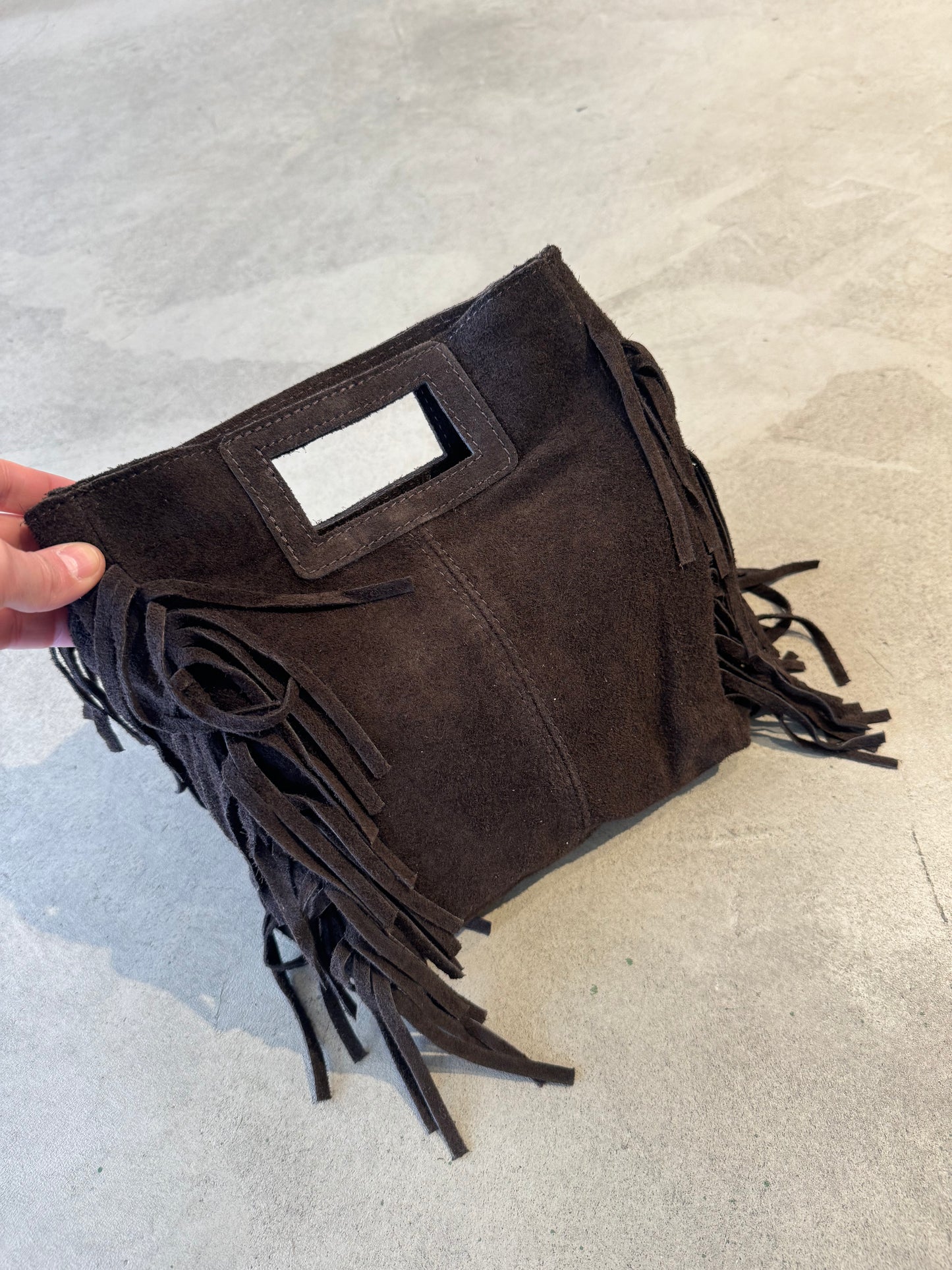 Borsa in camoscio con frange e tracolla